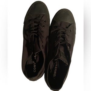 All black low-top Chuck Taylors